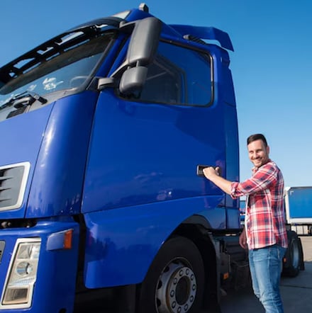 FAST LOGISTICS driver preparing a truck for a long-haul run